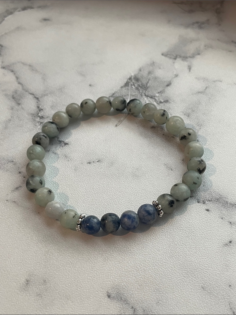 Natural stone, hand beaded elastic bracelet. 6.5 inches.